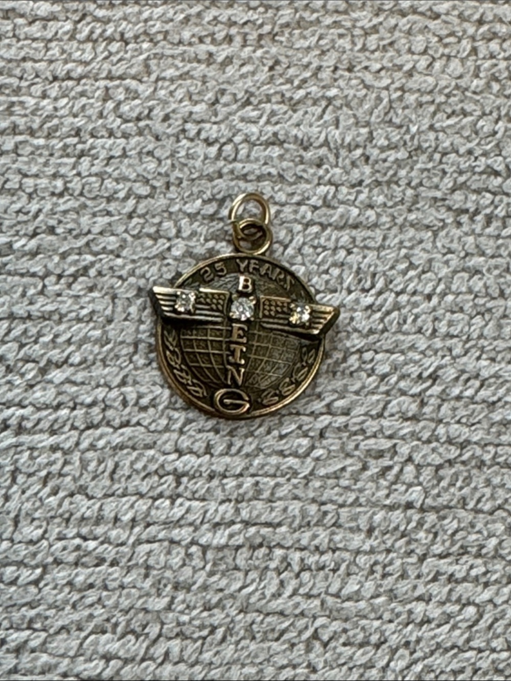 Befing 25 Years Gold-Tone Winged Globe Pendant Charm